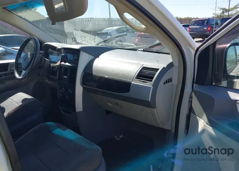 2010 Dodge Grand Caravan Sxt z USA, uszkodzony, nr VIN 2D4RN5D12AR210330